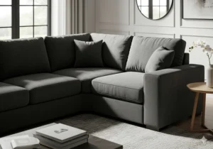 Corner view of the spacious L-shaped dark gray sectional sofa, ideal for maximizing seating.