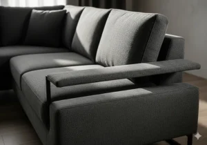 Modern dark gray sectional side view showing the sleek, slim armrest design.