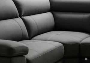 Detail shot of the plump, supportive back cushions and deep seating on this sectional.