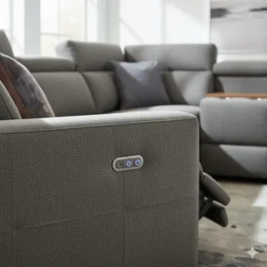 Close-up view of the smooth power reclining mechanism and control buttons on the arm of the modern sectional sofa.