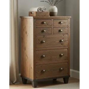 A tall rustic chest of drawers providing vertical storage space for clothing and linens.