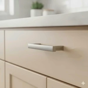 Brushed nickel hardware handle installed on a high-quality, durable maple kitchen cabinet door.