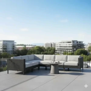 A sleek, contemporary outdoor sectional sofa made from dark grey resin patio furniture on a minimalist balcony.