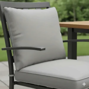 Close-up of a knife-edge style replacement cushion for an outdoor dining chair.
