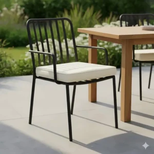Modern wrought iron outdoor dining chair with a simple slatted back design and cream cushion.