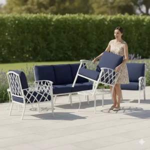 A person easily lifting and moving a lightweight cast aluminum chair on a patio.
