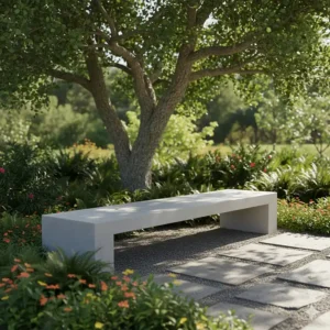 Long, simple, and elegant concrete garden bench placed under a tree, designed for permanent, low-maintenance seating in a backyard landscape.