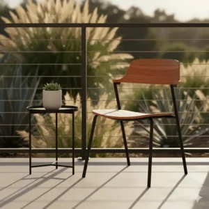 An Eames-era inspired mid century modern accent chair made of aluminum and wood, suitable for a small balcony or patio.