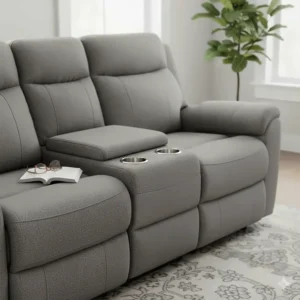 A reclining loveseat featuring a center storage console and integrated stainless steel cup holders.