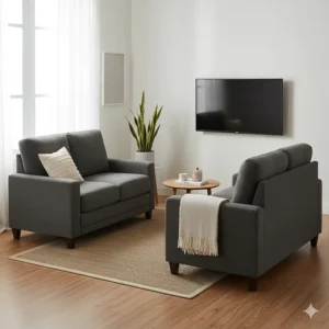 A compact reclining sofa and loveseat set styled in a smaller apartment-sized living area.