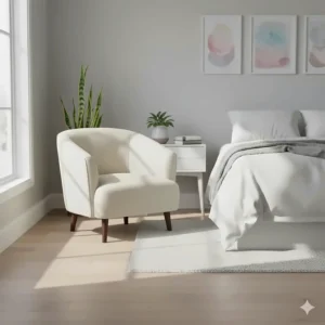 Small cream-colored upholstered accent chair under $200 placed in a master bedroom corner.