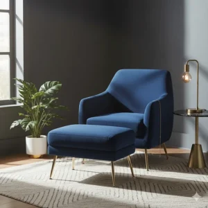Navy blue velvet accent chair with ottoman featuring gold metal legs for a glamorous interior.