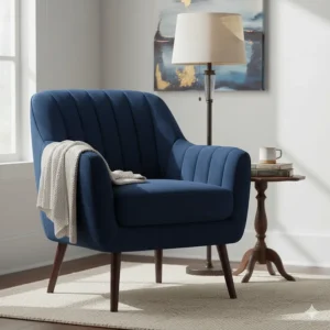 Deep navy blue velvet accent chair featuring a tufted backrest and dark wood legs.