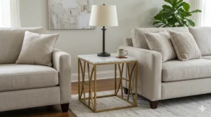 Luxury marble top end tables for living room staging with gold metallic accents and decorative accessories.