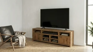 A large, rustic tv stand for 65 inch tv crafted from reclaimed white oak with distinctive grain, barn-style doors and metal hardware, adding farmhouse warmth to a media room.