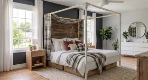 Cozy farmhouse canopy bed frame under $500 decorated with plaid throw blankets and decorative pillows.