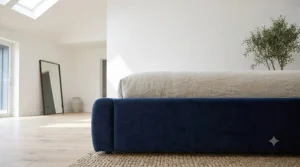 Side view of a soft-edged upholstered bed frame base tailored for headboard-free bedroom layouts.