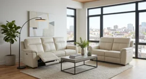 Minimalist off white leather living room set featuring a power reclining sofa and loveseat.